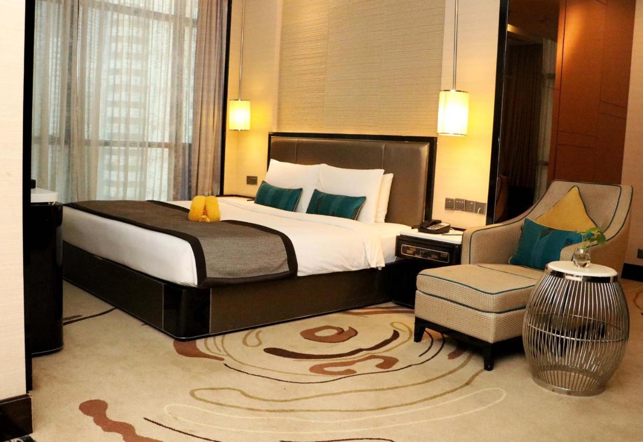 Pacific Regency Hotel Suites Kuala Lumpur Exterior foto A bedroom at the hotel